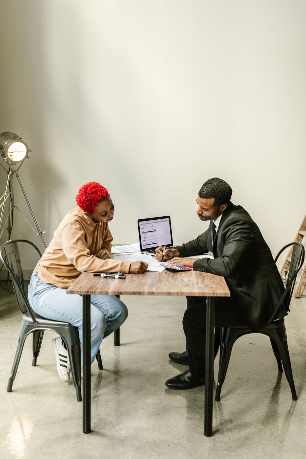 A client consultation across a table